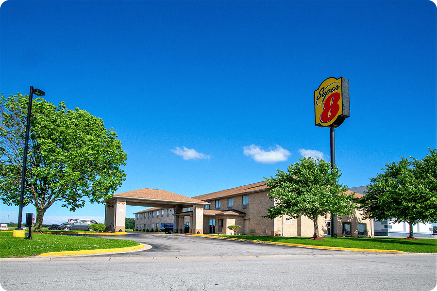 Super 8 motel exterior under blue sky