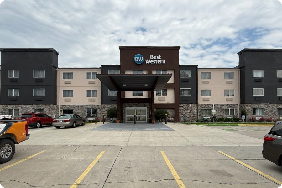Symmetrical brown and beige hotel exterior